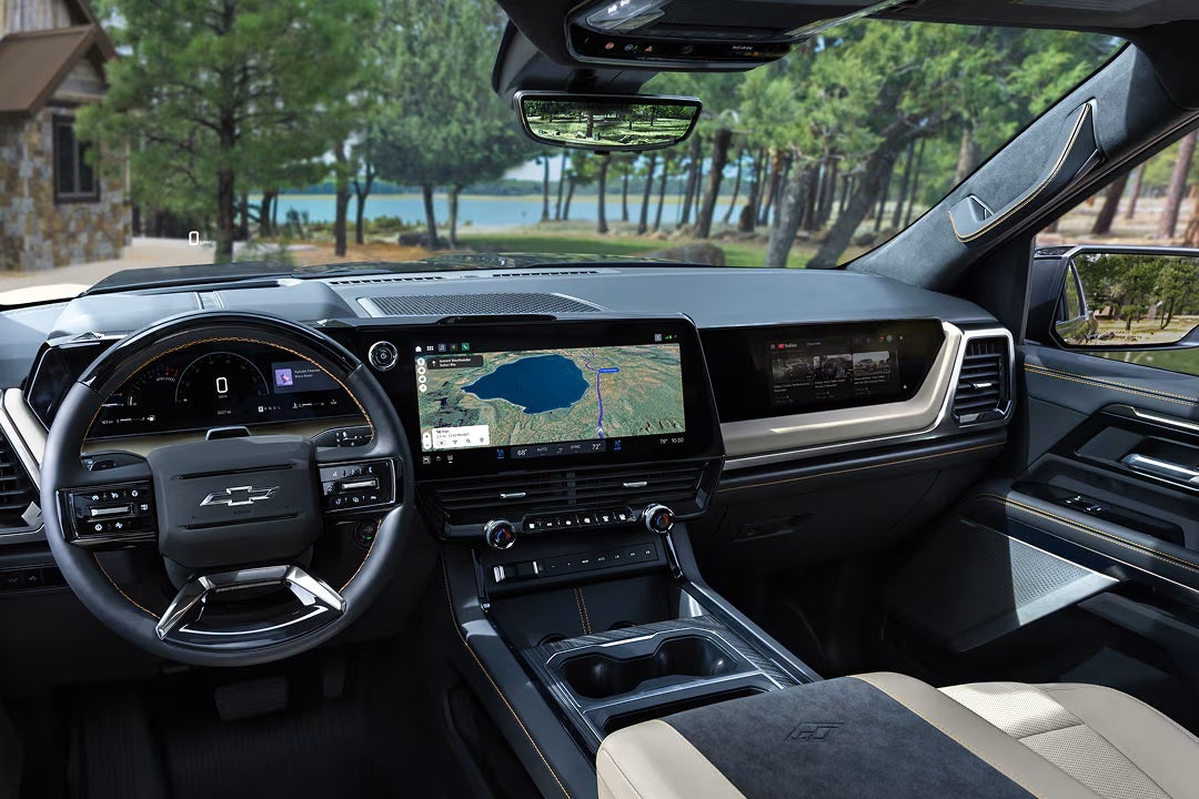 2027 Chevrolet Silverado interior showing 16.3-inch center display and passenger screen